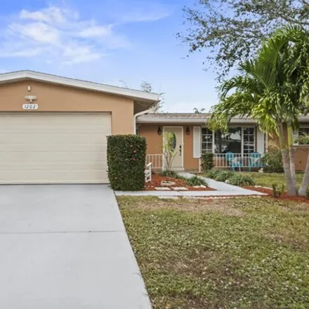Buy this 3 bed house on 1202 Yacht Club Boulevard in Indian Harbour Beach, Brevard County