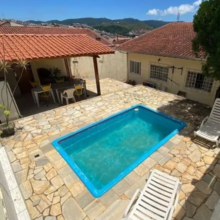 Buy this 3 bed house on Rua Solon de Oliveira in Região Urbana Homogênea XX, Poços de Caldas - MG