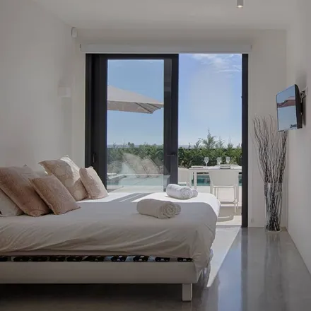 Rent this 4 bed house on S'Argamassa in Santa Eulària des Riu, Balearic Islands
