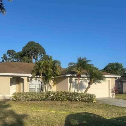 Buy this 3 bed house on 1725 Southwest Cycle Street in Port Saint Lucie, FL 34953