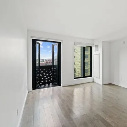 Image 2 - 11-39 49th Ave Unit 217, New York, 11101 - Apartment for rent