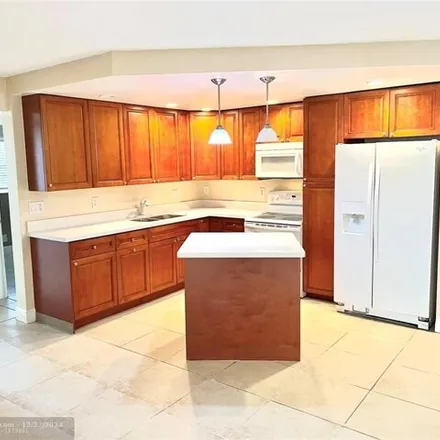 Buy this 3 bed condo on 4462 Treehouse Lane in Tamarac, FL 33319