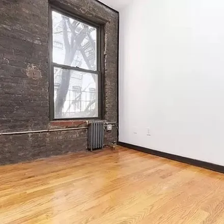 Rent this 4 bed apartment on 403 East 11th Street in New York, NY 10009