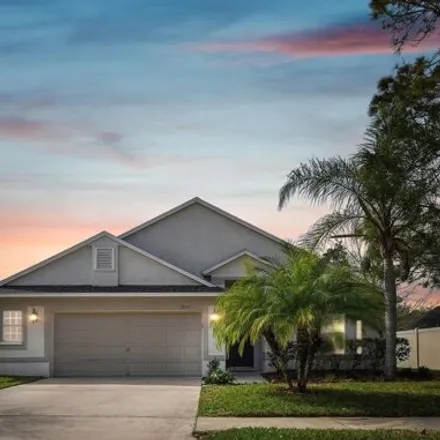 Rent this 4 bed house on 7643 Citrus Blossom Drive in Pasco County, FL 34637