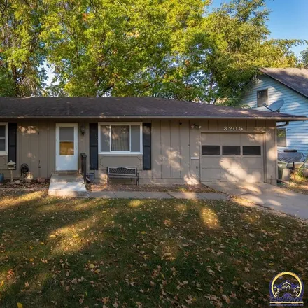 Buy this 4 bed house on 3205 Southwest Atwood Avenue in Topeka, KS 66614