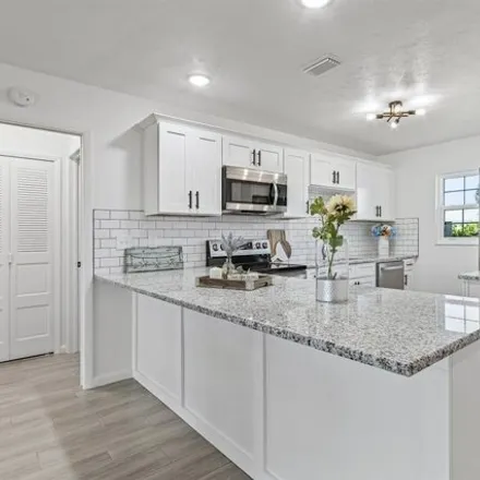 Image 1 - 1554 Saddle Woode Drive, Cypress Lake, FL 33919, USA - Condo for sale