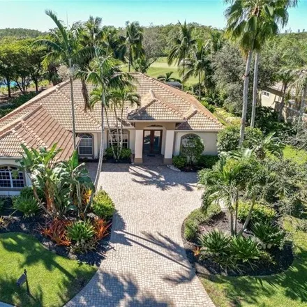 Buy this 4 bed house on Shadow Wood Country Club - South Course in 22801 Oakwilde Boulevard, Bonita Springs