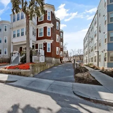 Buy this 14 bed house on 71 Walnut Park in Boston, MA 02146