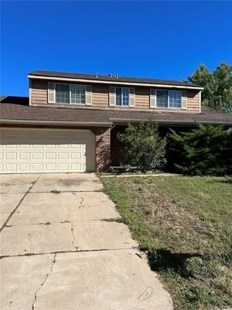 Buy this 4 bed house on 14537 E Evans Ave in Aurora, Colorado