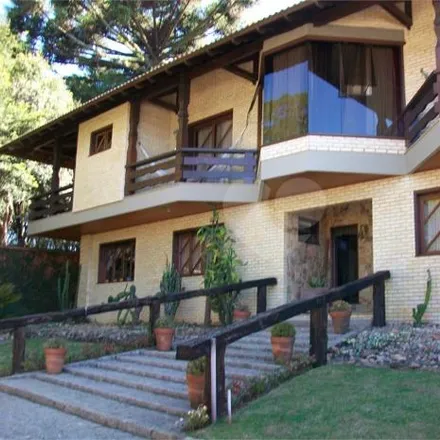 Buy this 4 bed house on Rua Santa Bertila Boscardin 220 in Santa Felicidade, Curitiba - PR