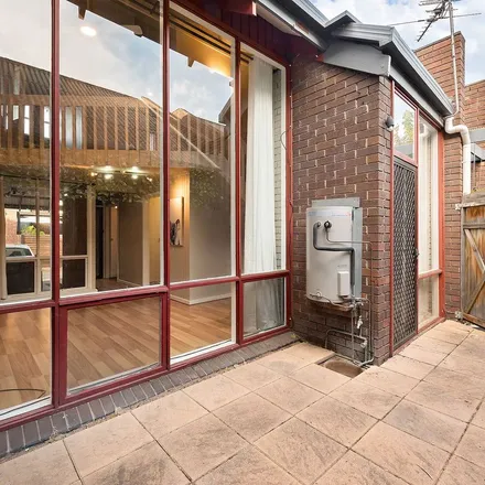 Rent this 2 bed townhouse on Adelaide City Optometrist in 127 Gilles Street, Adelaide SA 5000