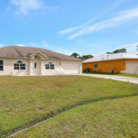 Image 2 - 2443 Southwest Falcon Circle, Port Saint Lucie, FL 34953, USA - House for sale