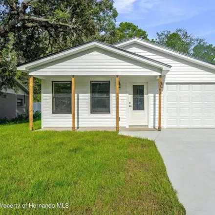 Buy this 3 bed house on 5385 Berrien Avenue in Spring Hill, FL 34608