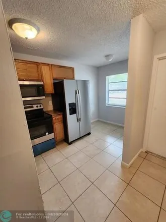 Buy this 2 bed condo on 4091 Lakeside Drive in Tamarac, FL 33319