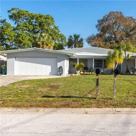 Buy this 5 bed house on 2727 Pinehurst Avenue in Belleair Bluffs, Pinellas County
