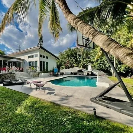 Buy this 5 bed house on 5201 Northeast 5th Avenue in Bayshore, Miami