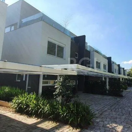 Buy this 3 bed house on Rua Doutor Ney de Castilhos Ferreira in Pedra Redonda, Porto Alegre - RS
