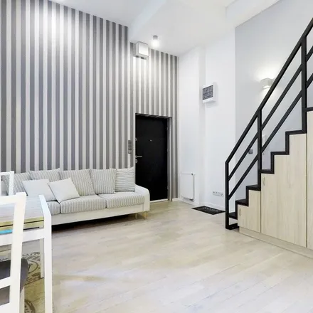 Rent this 3 bed apartment on Delikatesy Premium in Przewóz 34a, 30-716 Krakow