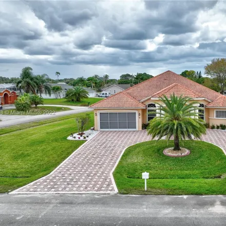 Buy this 5 bed house on 160 Southwest Saratoga Avenue in Port Saint Lucie, FL 34953