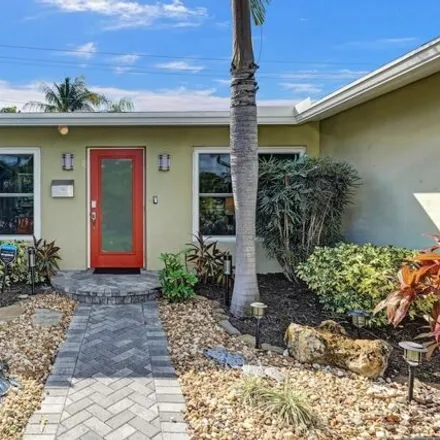 Buy this 3 bed house on 1820 Northeast 54th Street in Coral Ridge Isles, Fort Lauderdale