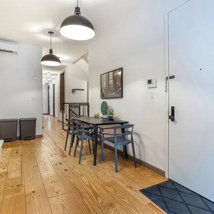 Rent this 4 bed apartment on 209 West 135th Street in New York, NY 10030