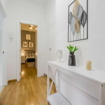 Rent this 6 bed apartment on Calle de la Aviación Española in 28003 Madrid, Spain