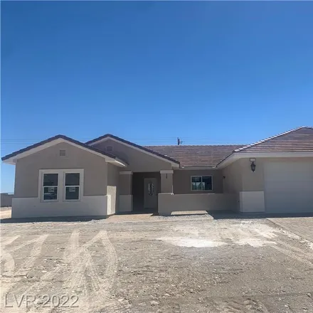 Buy this 4 bed house on 4581 Honey Locust Drive in Pahrump, NV 89061