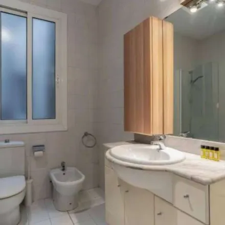 Rent this 4 bed apartment on Carrer del Consell de Cent in 08013 Barcelona, Spain