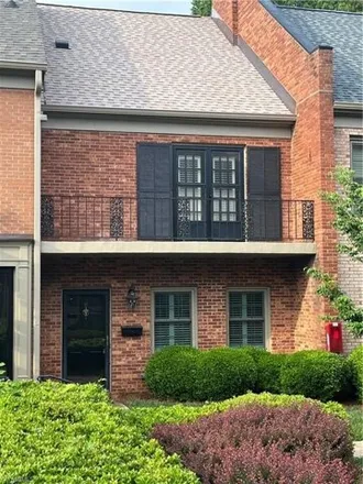 Rent this 2 bed townhouse on 1871 Banking Street in Fairfield, Greensboro