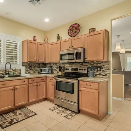 Rent this 3 bed house on Apache Junction in AZ, 85218