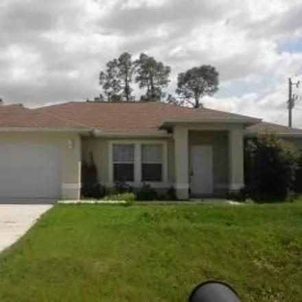 Rent this 3 bed house on 994 Congress Avenue in Lehigh Acres, FL 33972