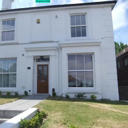 Rent this 2 bed apartment on 82 Woodlands Road in Redhill, RH1 6HB