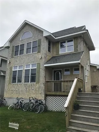 Rent this 4 bed house on 22 Bungalow Walk in Village of Ocean Beach, Islip