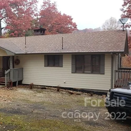 Buy this 3 bed house on Grassy Creek Golf & Country Club in 2360 Swiss Pine Lake Drive, Spruce Pine