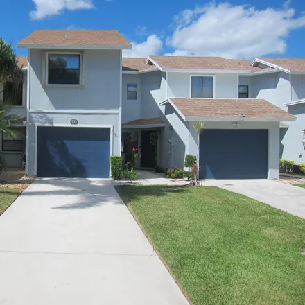 Rent this 3 bed townhouse on 1787 Woodbridge Lakes Circle in Palm Beach County, FL 33406