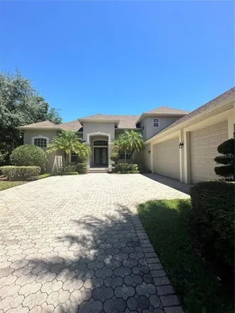 Buy this 4 bed house on 8315 Tibet-Butler Drive in Orange County, FL 34786
