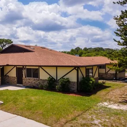 Buy this 3 bed house on 6316 Sleeping Hollow Drive in Brevard County, FL 32780