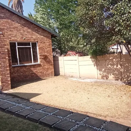 Rent this 4 bed townhouse on Charles Cilliers Street in Govan Mbeki Ward 30, Secunda