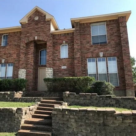 Rent this 4 bed house on 400 Valley View Drive in Lewisville, TX 75077