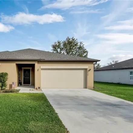 Buy this 4 bed house on 16349 Blooming Cherry Drive in Groveland, FL 34736