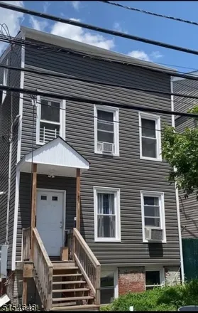 Buy this 4 bed townhouse on Putnam Street in Paterson, NJ 07524