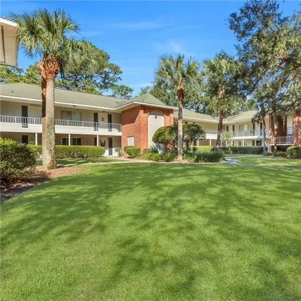 Buy this 2 bed townhouse on Sea Palms Golf Club in 5445 Frederica Road, Blackbanks