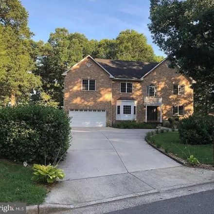 Rent this 4 bed house on 7031 Beverly Lane in Springfield, VA 22150