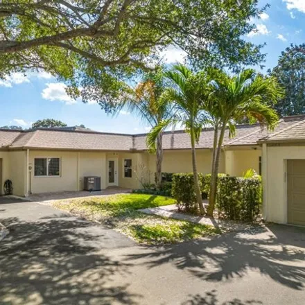 Buy this 3 bed house on 236 Country Club Dr in Melbourne, Florida