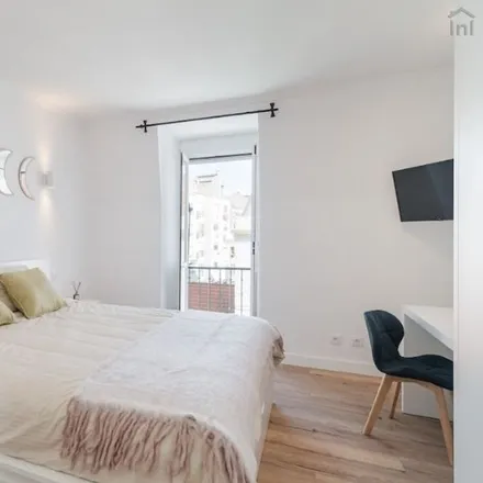 Rent this 6 bed room on Rua Carrilho Videira