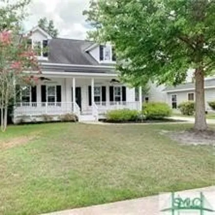 Rent this 4 bed house on 27 Golden Rod Loop in Richmond Hill, GA 31324