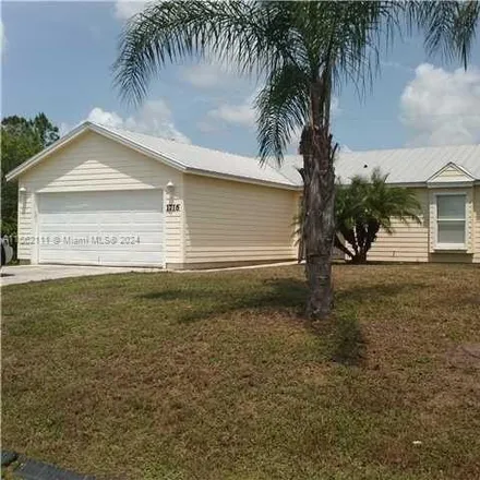 Buy this 3 bed house on 1674 Southwest Cordova Street in Port Saint Lucie, FL 34987