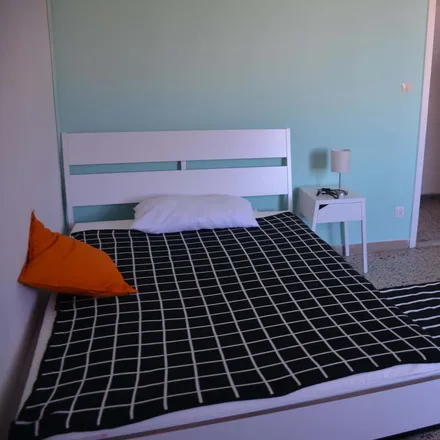 Rent this 7 bed room on Via Ingurtosu 9 in 09121 Cagliari Casteddu/Cagliari, Italy
