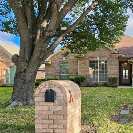 Rent this 4 bed house on Green Oaks Boulevard in Arlington, TX 76017
