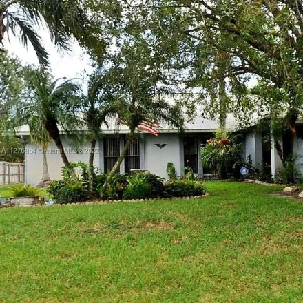 Rent this 3 bed house on 1921 Southwest Hickock Terrace in Port Saint Lucie, FL 34953